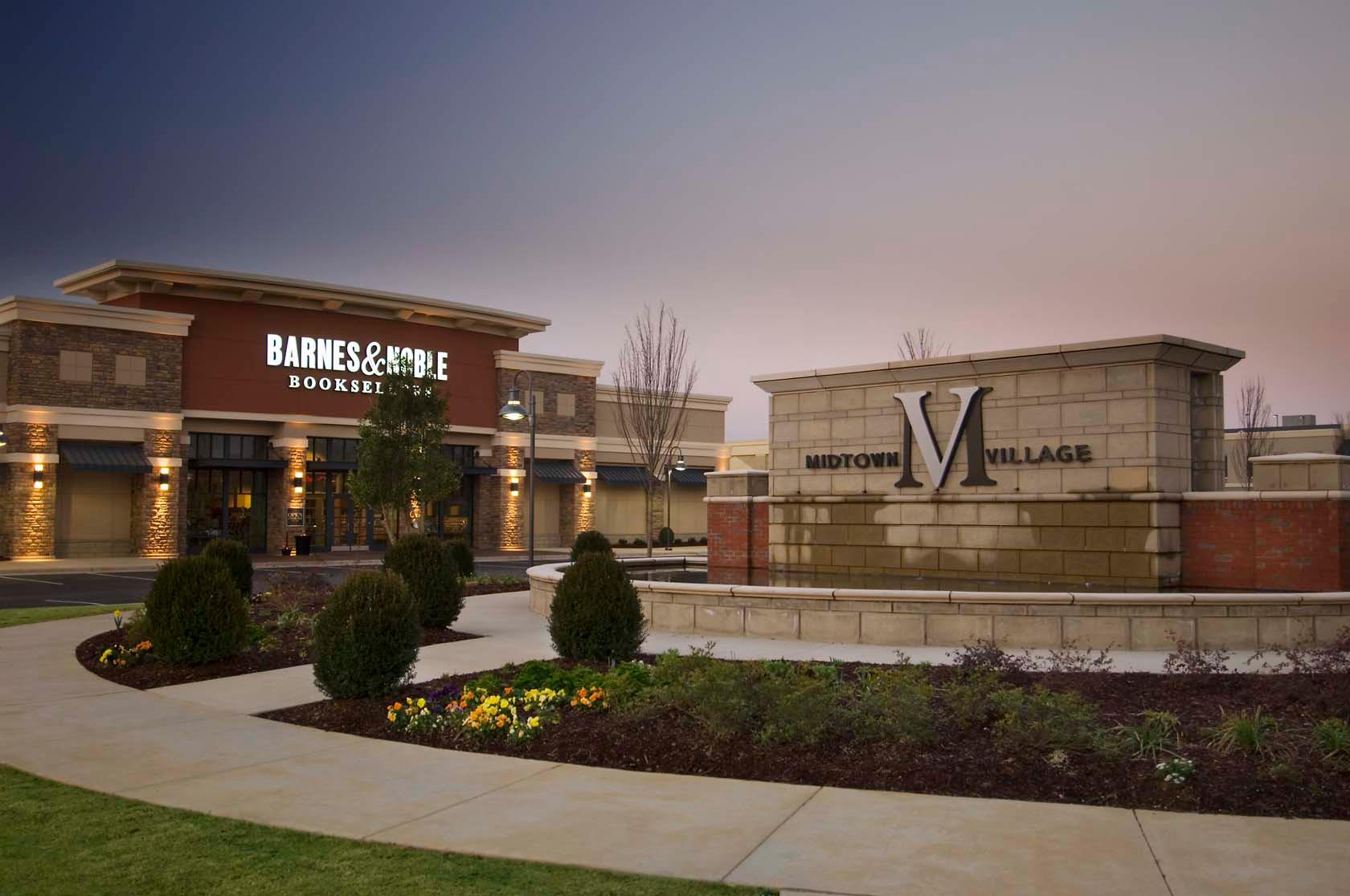 A shopping center with Barnes & Noble in the background