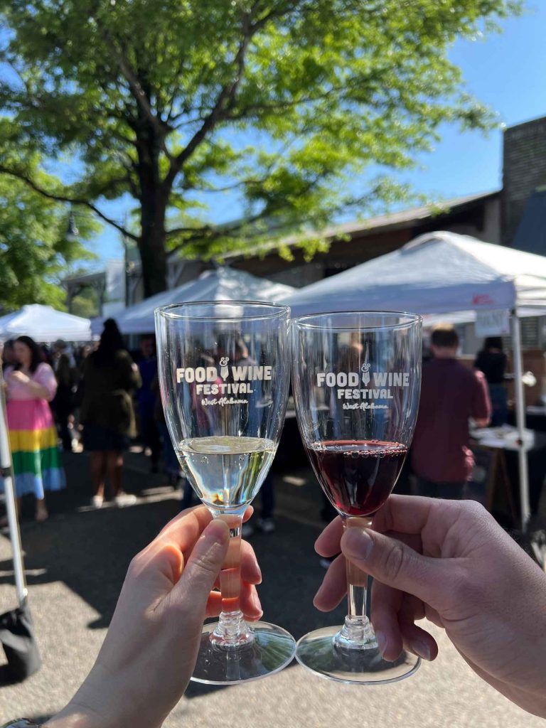 Two glasses clinking with a cheers!