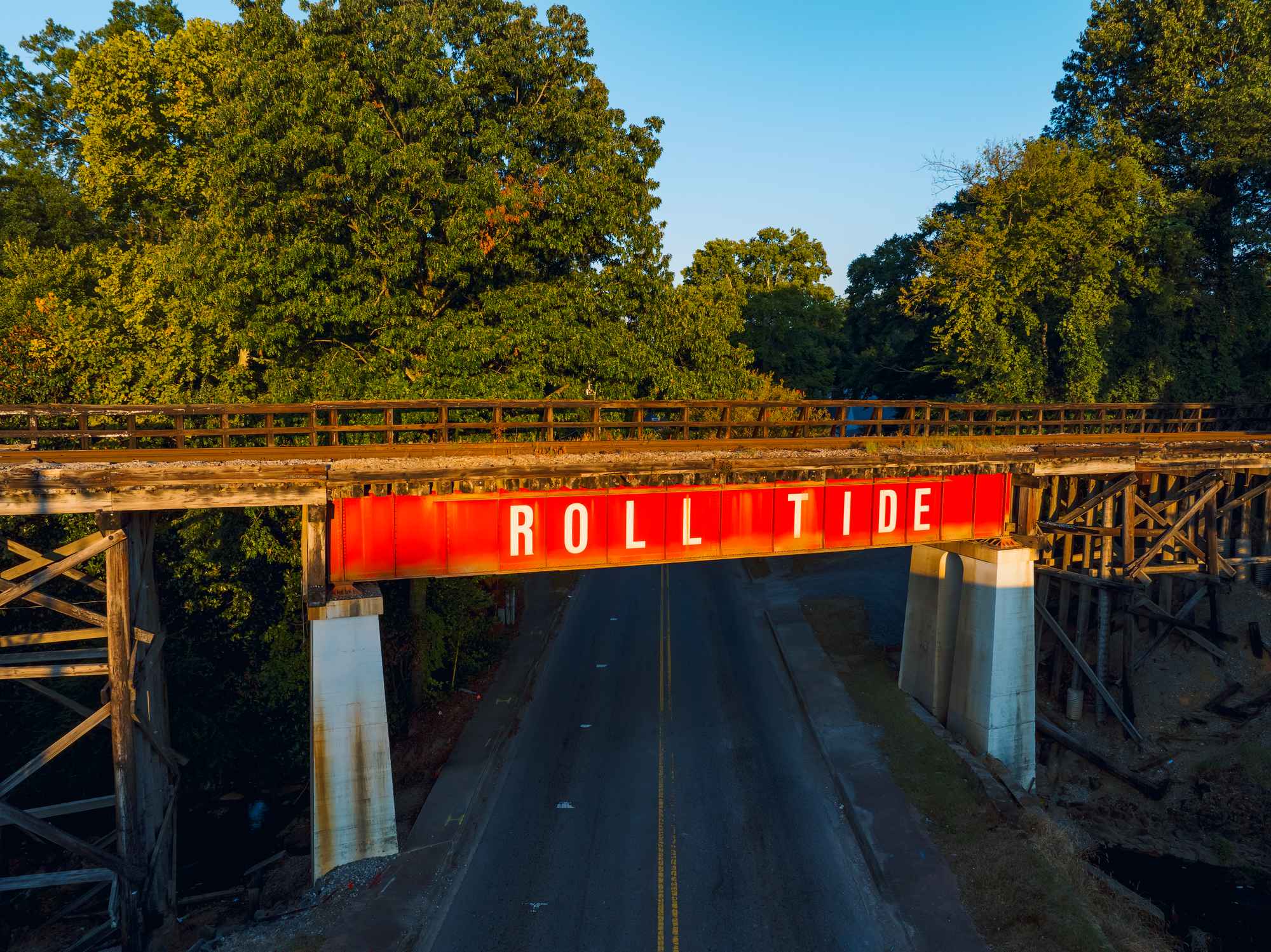 A bridge with the words Roll Tide on the side