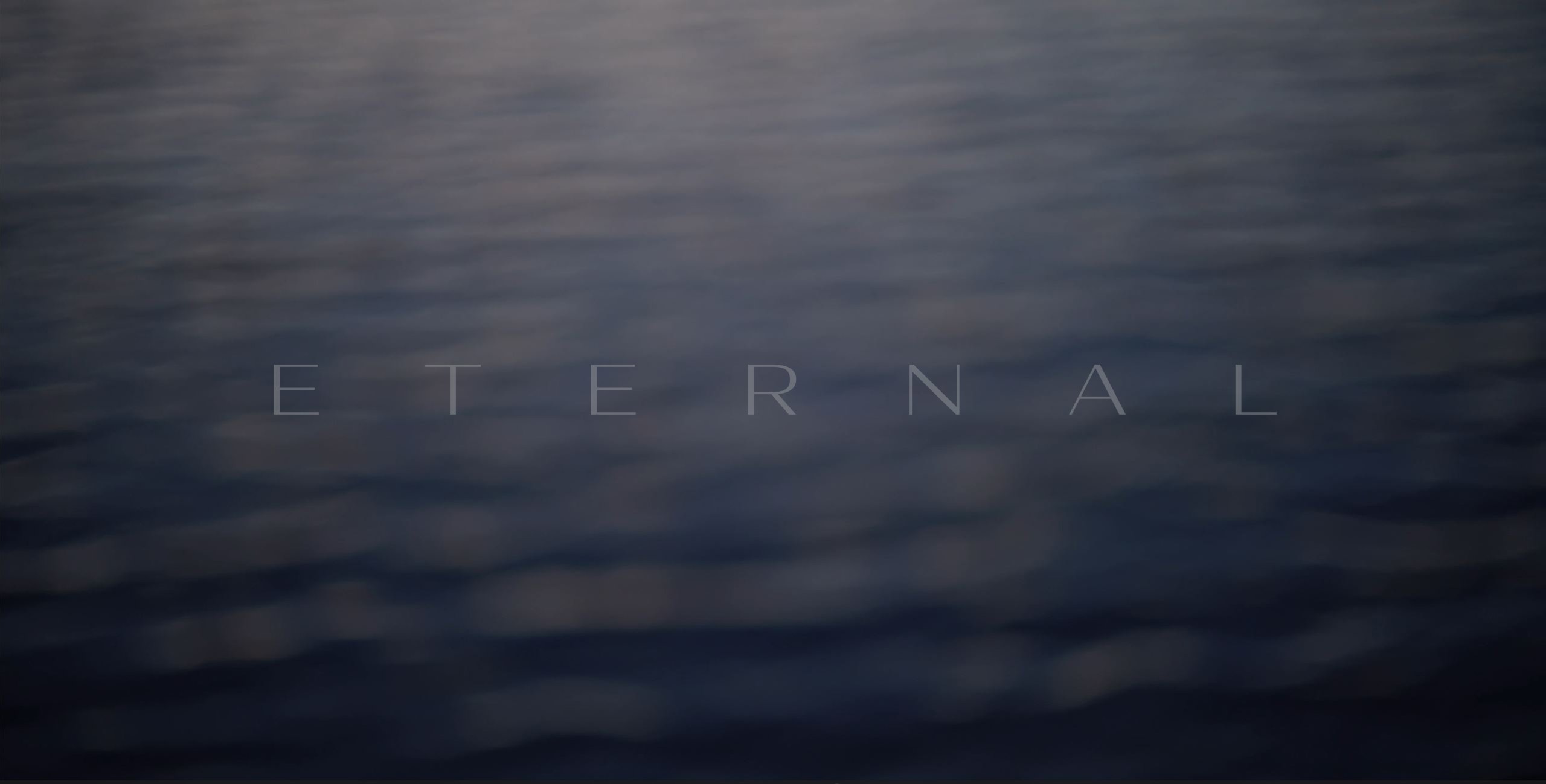 A serene, blurred image of rippling water with the word 'ETERNAL' inscribed in light gray letters across the center