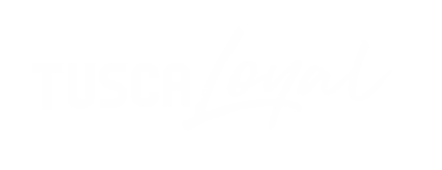 TUSCA Loyal logo featuring bold, stylized text with a dynamic, flowing design