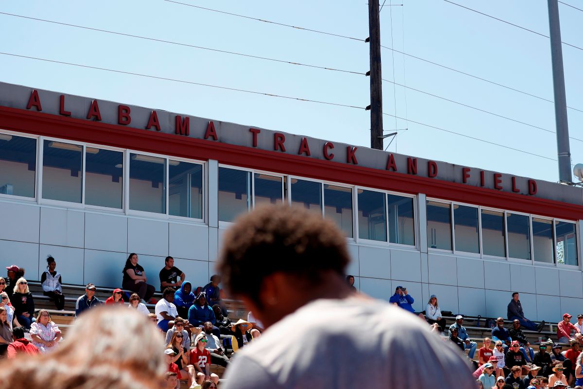 Alabama Track and Field stadium, with fans watching a sporting event in Tuscaloosa, Alabama.