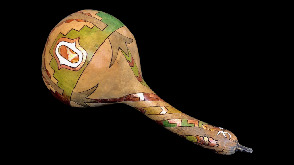A beautifully decorated gourd shaker with intricate patterns and colors in Tuscaloosa, Alabama.