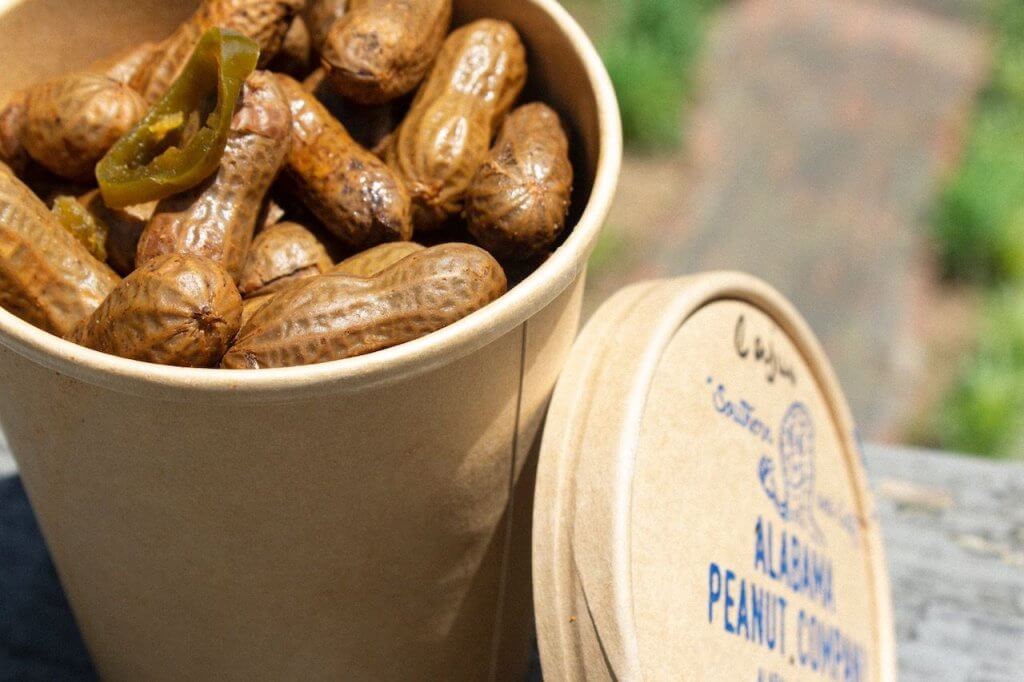 A bowl filled with roasted peanuts and pickled jalapeño slices in Tuscaloosa, Alabama.