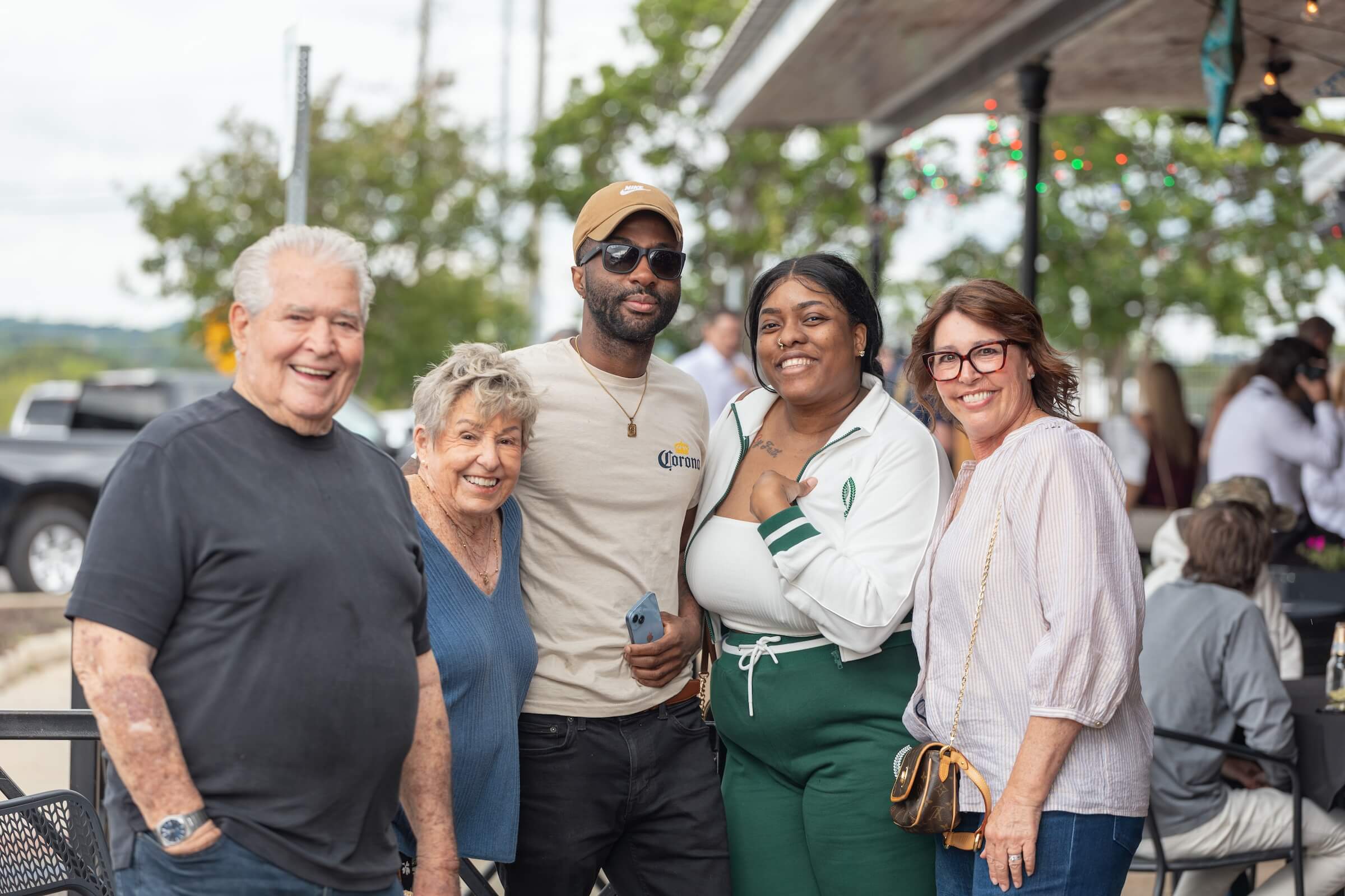 Group of individuals enjoying the food scene in downtown Tuscaloosa, Alabama