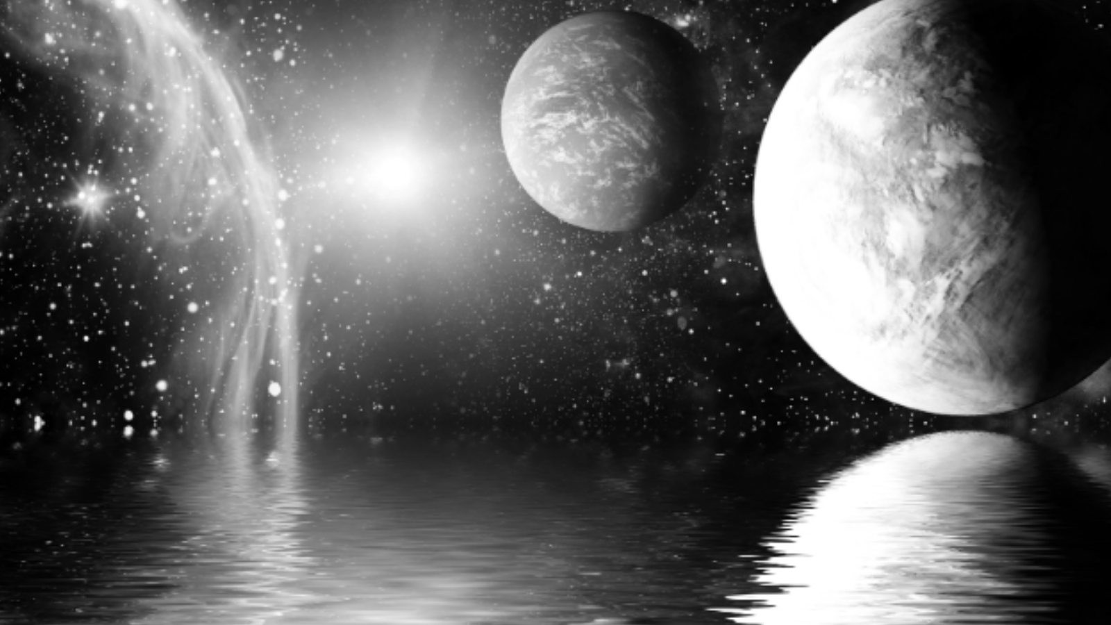 Two planets floating in space with a bright star reflecting on water in Tuscaloosa, Alabama.